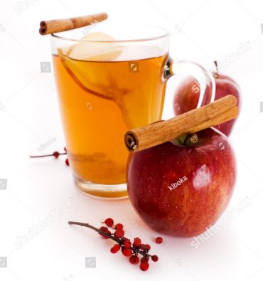 stock-photo-cup-od-apple-cider-and-rolls-of-cinnamon-71403850